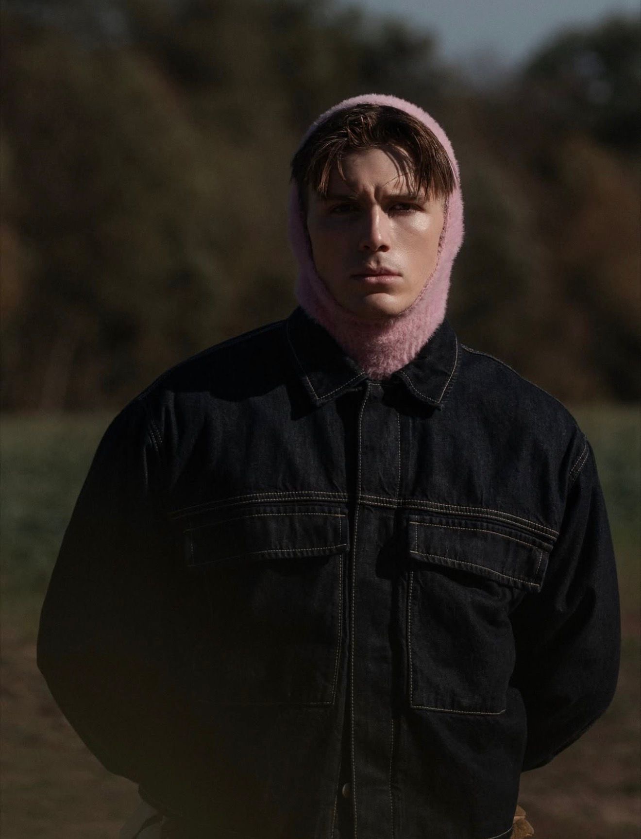 Portrait in pink balaclava at golden hour